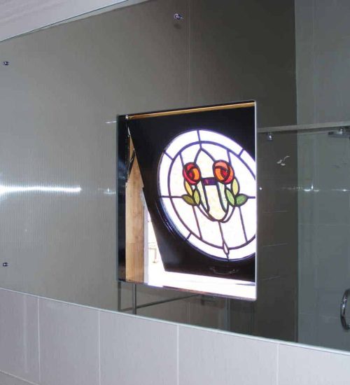 Cutout-in-middle-of-mirror-to-allow-for-a-lead lite-window